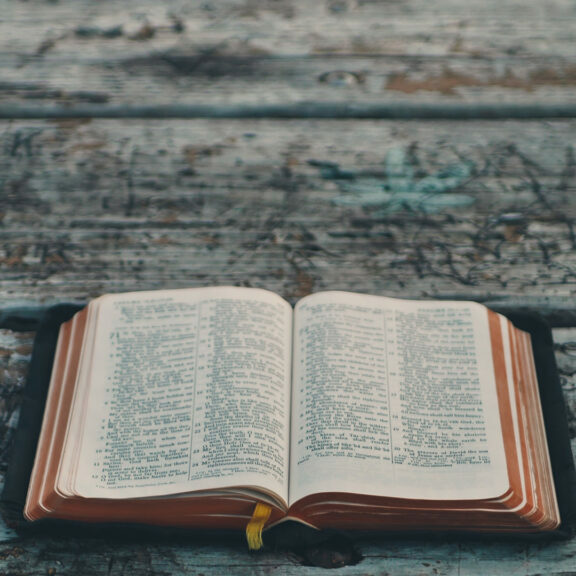 Bible-on-gray-wooden-table